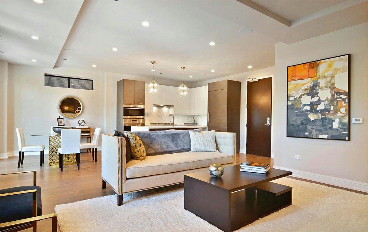 The interior of a modern apartment building with an open floor plan 